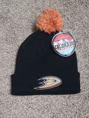 Zephyr Black Knit Beanie with Orange Pom and Ducks Logo